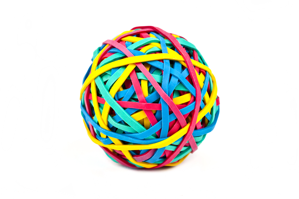 A,Ball,Made,Up,From,Rubber/elastic,Bands,Over,A,White