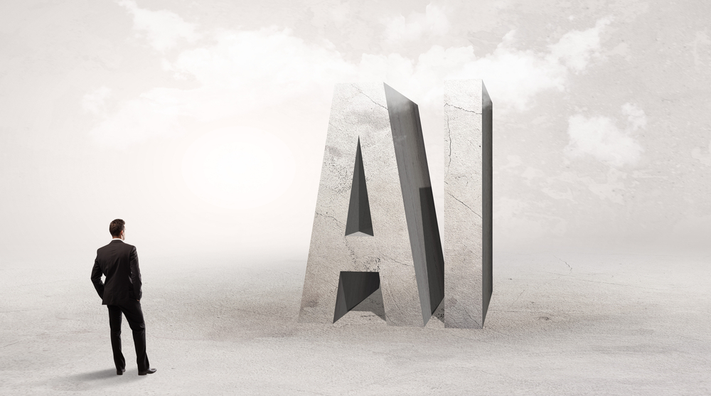 Business professional looking at large concrete AI letters symbolizing the future of AI mortgage lending technology.