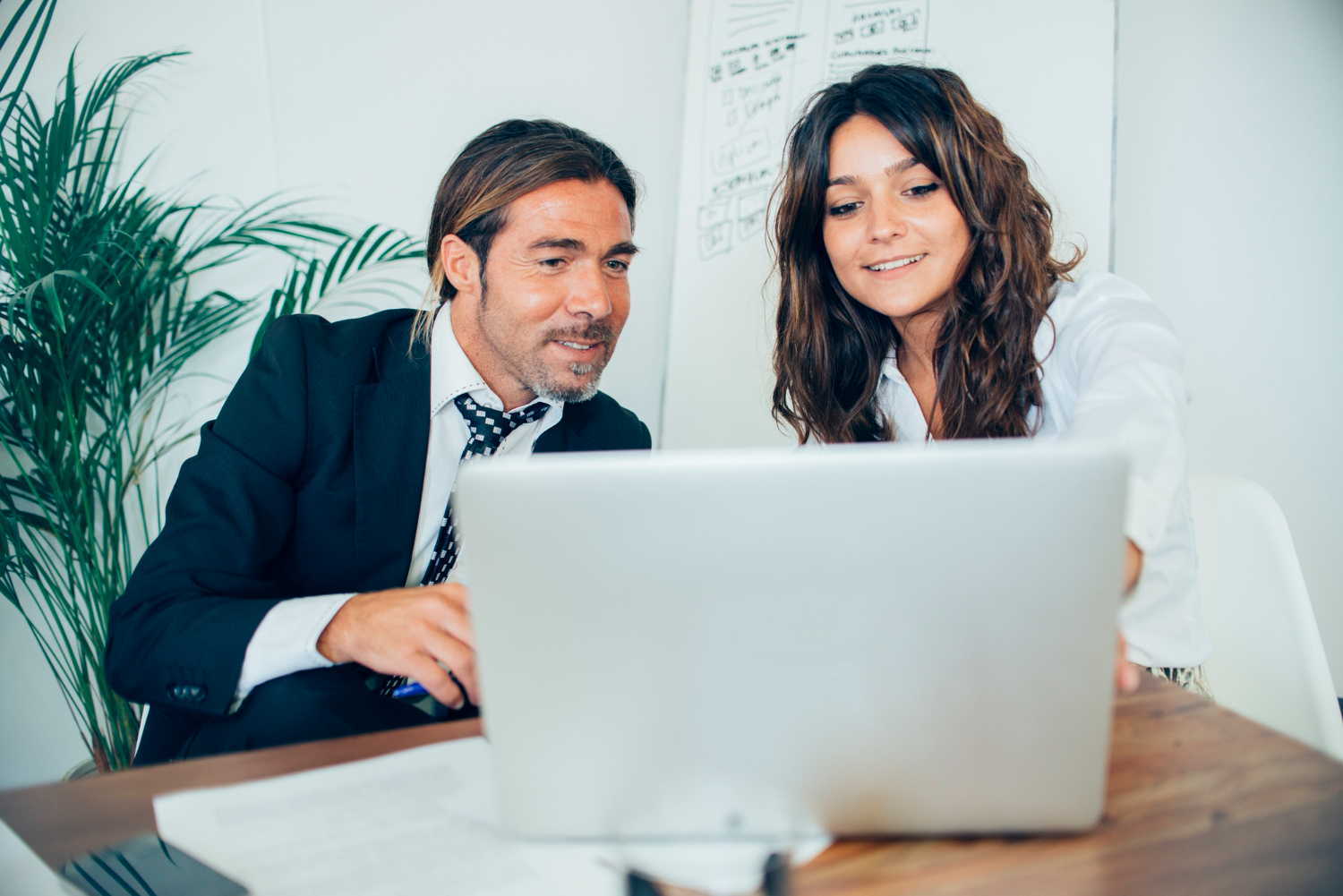 Loan officer using Mortgage Maker software to present options clearly to clients.